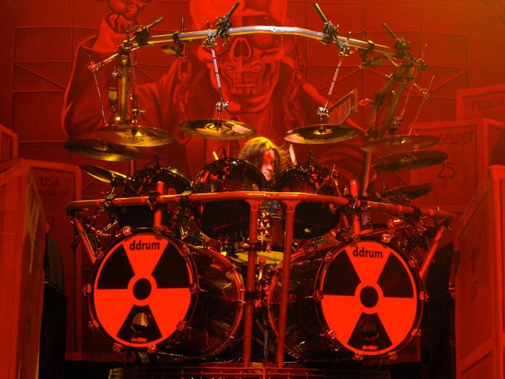 Megadeth drum kit under red stage light