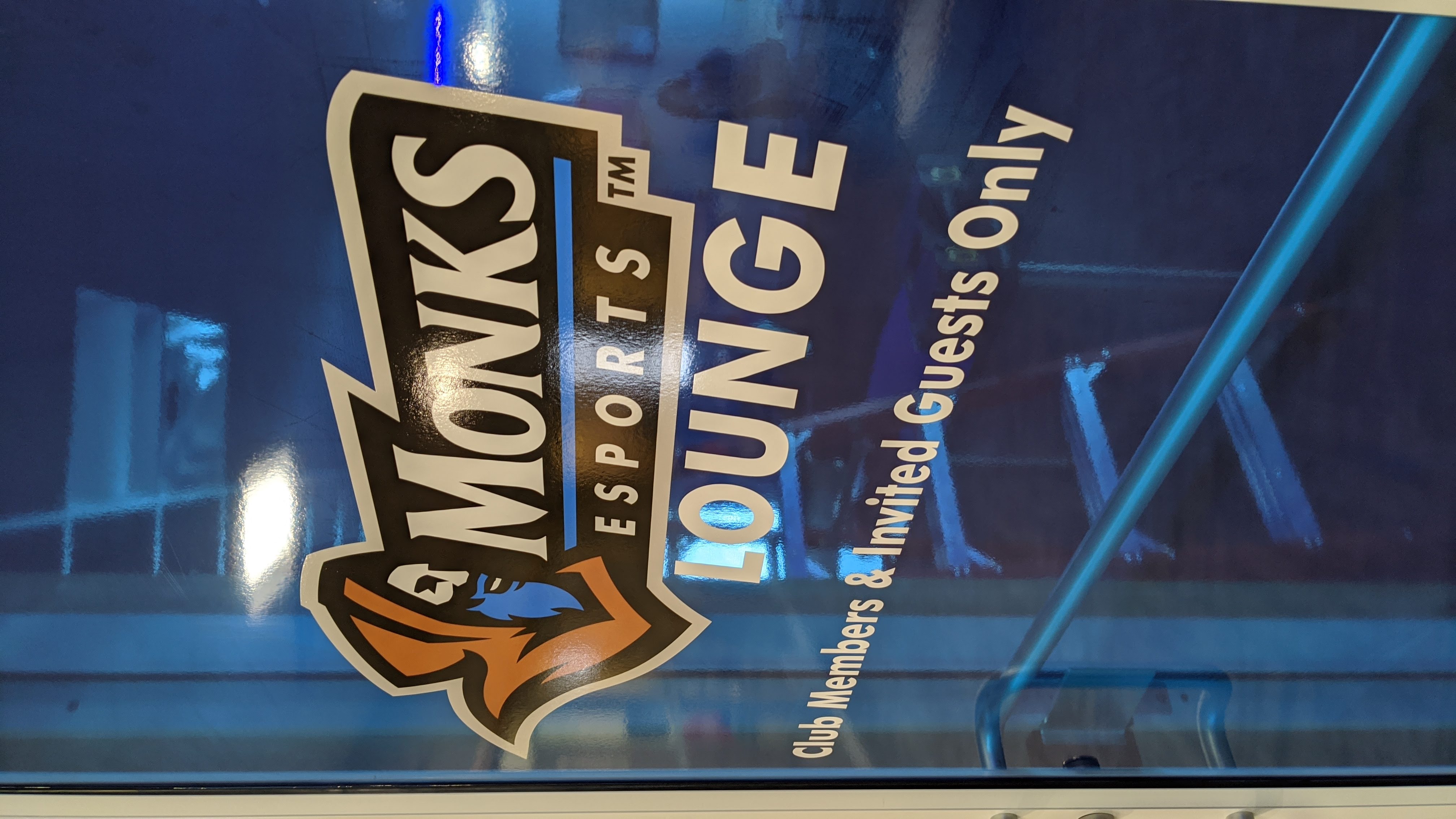 Monks Esports Lounge door graphic